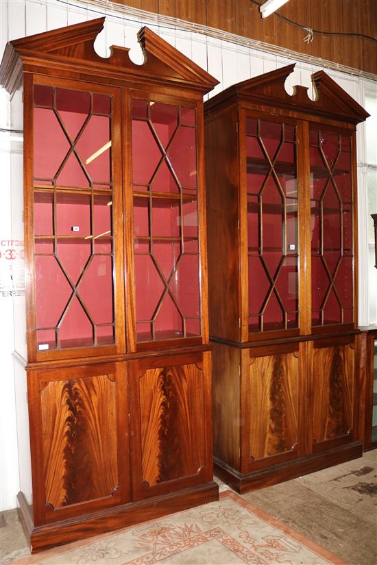 Pair of mahogany large glazed door bookcases